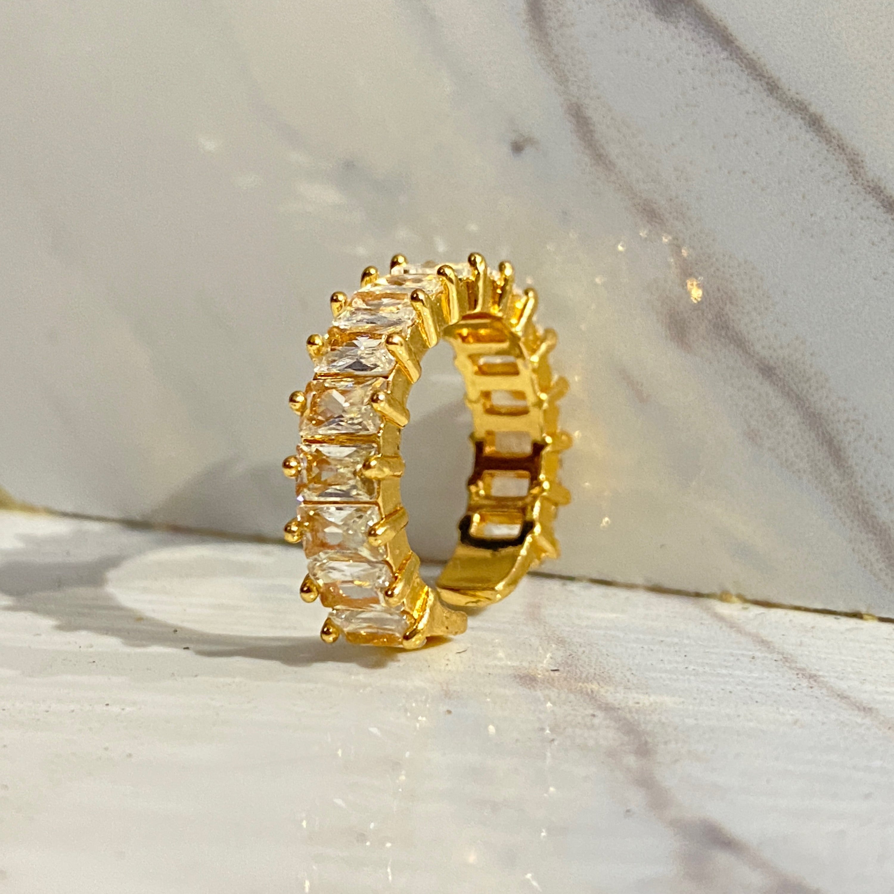 Minimalist gold ring with delicate diamond accent